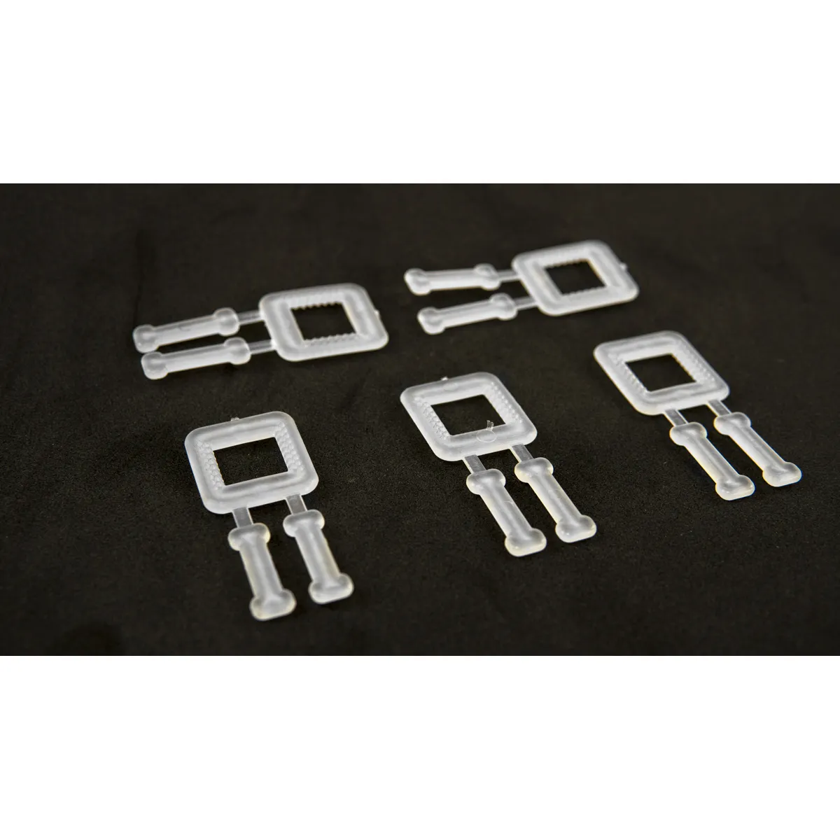 Kapëse plastike të bardha për shirita paketimi PP (BUCKLES-5P) 12 mm