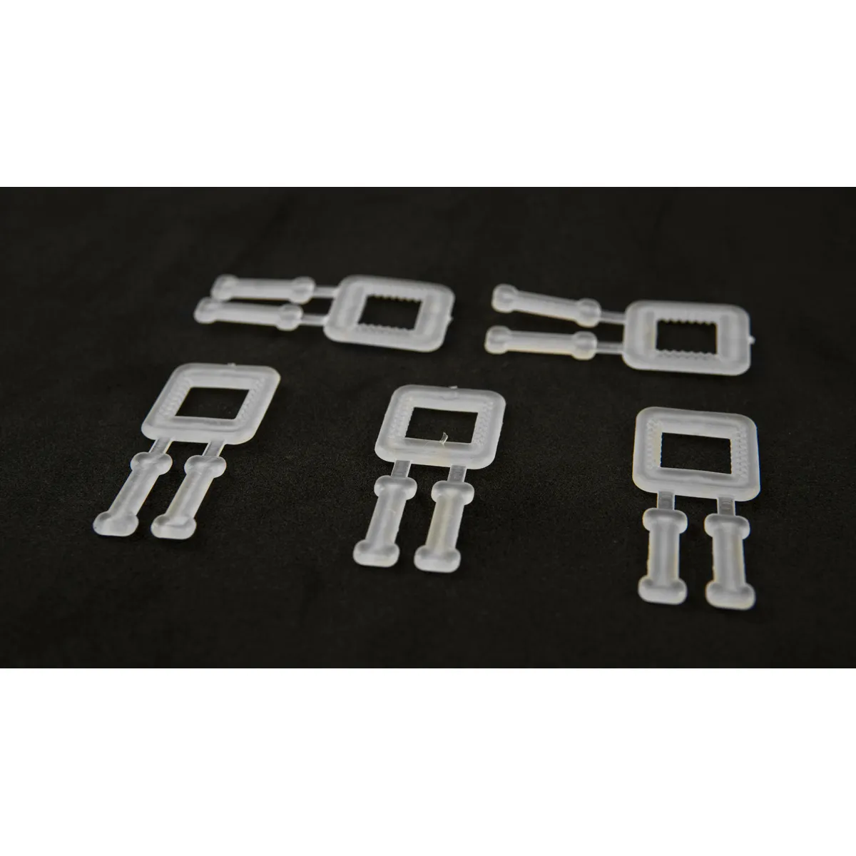 Kapëse plastike të bardha BUCKLES-5P për shirita paketimi PP 12 mm
